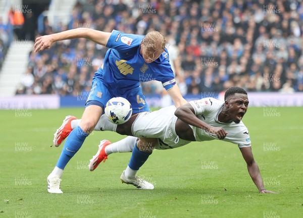 200925 - Birmingham City v Swansea City - Sky Bet Championship - Zeidane Inoussa of Swansea and Christoph Klarer of Birmingham