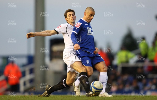 28.12.08 - Birmingham City v Swansea City, Coca Cola Championship.- Swansea's Angel Rangel tackles Birmingham's Kevin Phillips  