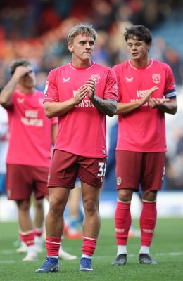 101026 - Blackburn Rovers v Cardiff City - Sky Bet Championship - Isaak Davies of Cardiff and Perry Ng applaud the fans at the end of the match