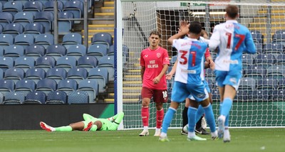 101026 - Blackburn Rovers v Cardiff City - Sky Bet Championship - Alex Robertson of Cardiff watches Blackburn celebrate as goalkeeper Nathan Trott lies on the ground