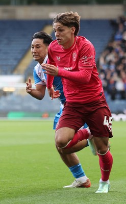 101026 - Blackburn Rovers v Cardiff City - Sky Bet Championship - Cian Ashford of Cardiff races Ryoya Morishita of Blackburn