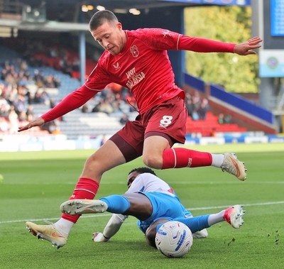 101026 - Blackburn Rovers v Cardiff City - Sky Bet Championship - Jack Moylan of Cardiff and Ryan Alebiosu of Blackburn try to get to the ball