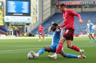 101026 - Blackburn Rovers v Cardiff City - Sky Bet Championship - Jack Moylan of Cardiff and Ryan Alebiosu of Blackburn try to get to the ball
