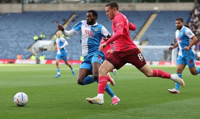 101026 - Blackburn Rovers v Cardiff City - Sky Bet Championship - Jack Moylan of Cardiff and Ryan Alebiosu of Blackburn try to get to the ball