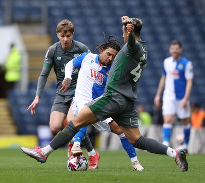 150325 - Blackburn Rovers v Cardiff City - Sky Bet Championship - Callum Robinson of Cardiff takes the ball from Tyrhys Dolan of Blackburn