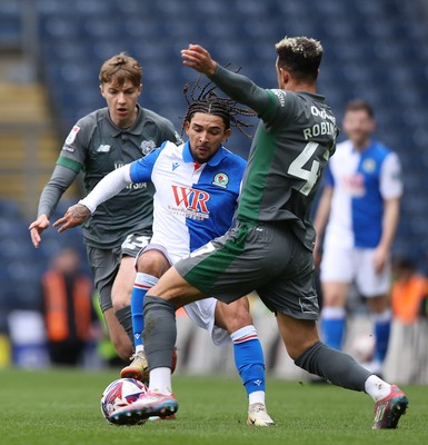 150325 - Blackburn Rovers v Cardiff City - Sky Bet Championship - Callum Robinson of Cardiff takes the ball from Tyrhys Dolan of Blackburn