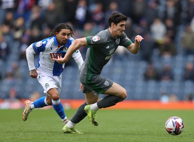 150325 - Blackburn Rovers v Cardiff City - Sky Bet Championship - Callum O'Dowda of Cardiff is tailed by Tyrhys Dolan of Blackburn