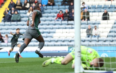 150325 - Blackburn Rovers v Cardiff City - Sky Bet Championship - Yakou Meite of Cardiff celebrates scoring a goal with Goalkeeper Ainsley Pears of Blackburn floored