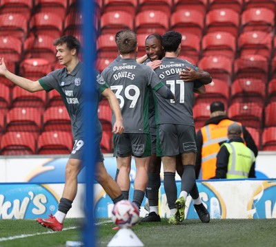 150325 - Blackburn Rovers v Cardiff City - Sky Bet Championship - Yakou Meite of Cardiff celebrates scoring their second goal with Isaak Davies of Cardiff Callum O'Dowda of Cardiff and Will Alves