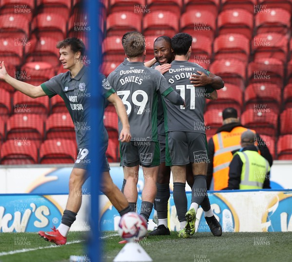 150325 - Blackburn Rovers v Cardiff City - Sky Bet Championship - Yakou Meite of Cardiff celebrates scoring their second goal with Isaak Davies of Cardiff Callum O'Dowda of Cardiff and Will Alves