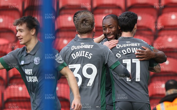 150325 - Blackburn Rovers v Cardiff City - Sky Bet Championship - Yakou Meite of Cardiff celebrates scoring their second goal with Isaak Davies of Cardiff Callum O'Dowda of Cardiff and Will Alves