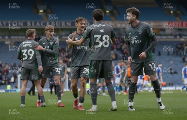 150325 - Blackburn Rovers v Cardiff City - Sky Bet Championship - Calum Chambers of Cardiff celebrates at the end of the match with Perry Ng of Cardiff and Alves