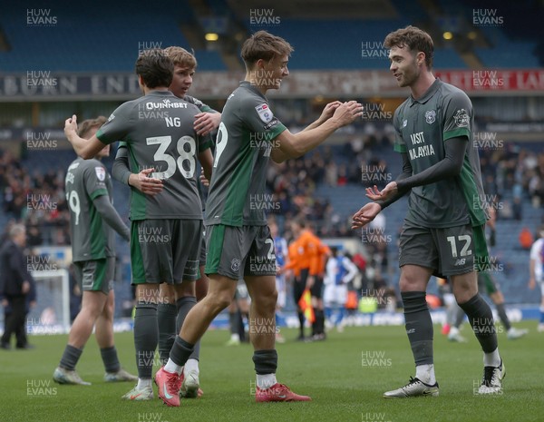 150325 - Blackburn Rovers v Cardiff City - Sky Bet Championship - Perry Ng of Cardiff and Alves and Calum Chambers of Cardiff celebrate at the end of the match