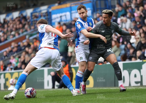 150325 - Blackburn Rovers v Cardiff City - Sky Bet Championship - Callum Robinson of Cardiff is held back by Hayden Carter of Blackburn and Sondre Tronstad of Blackburn