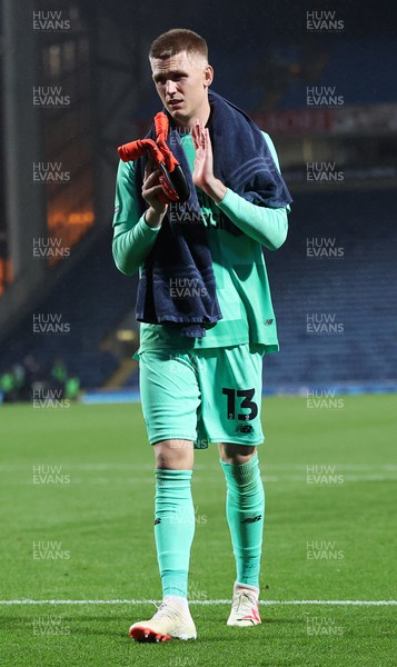 270923 - Blackburn Rovers v Cardiff City - Carabao Cup Third Round - A dejected Goalkeeper Alex Runarsson of Cardiff applauds the Cardiff fans at the end of the match