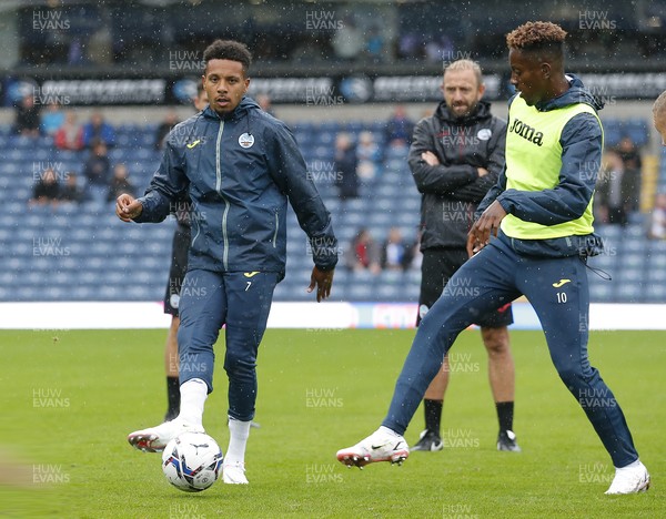 070821 - Blackburn Rovers v Swansea City - Sky Bet Championship - Jamal Lowe of Swansea warms up before the match with Korey Smith of Swansea