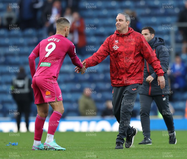281023 - Blackburn Rovers v Swansea City - Sky Bet Championship - Head Coach Michael Duff  of Swansea greets Jerry Yates of Swansea at the end of the match