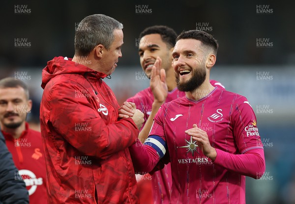281023 - Blackburn Rovers v Swansea City - Sky Bet Championship - Head Coach Michael Duff  of Swansea greets Matt Grimes of Swansea at the end of the match