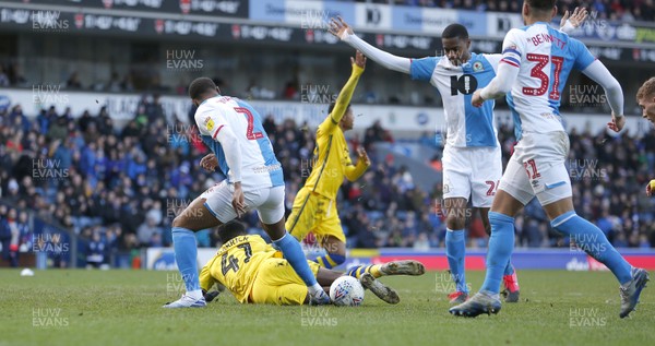 290220 - Blackburn Rovers v Swansea City - Sky Bet Championship - Jordon Garrick of Swansea is brought down in the penalty area by Ryan Nyambe of Blackburn Rovers for a penalty