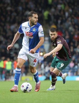 300925 - Blackburn Rovers v Swansea City - Sky Bet Championship - Zan Vipotnik of Swansea and Yuri Ribeiro of Blackburn