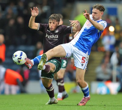 300925 - Blackburn Rovers v Swansea City - Sky Bet Championship - Goncalo Franco of Swansea and Taylor Gardner-Hickman of Blackburn