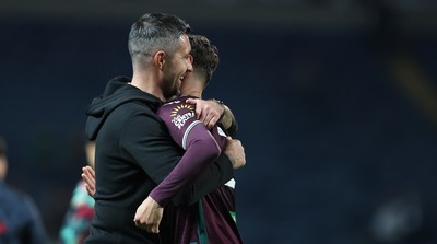 300925 - Blackburn Rovers v Swansea City - Sky Bet Championship - Swansea manager Alan Sheehan congrats Liam Cullen of Swansea at the end of the match