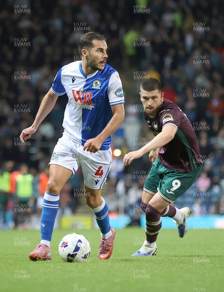 300925 - Blackburn Rovers v Swansea City - Sky Bet Championship - Zan Vipotnik of Swansea and Yuri Ribeiro of Blackburn