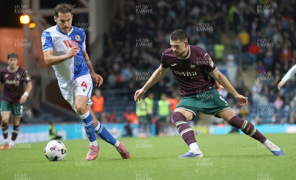 300925 - Blackburn Rovers v Swansea City - Sky Bet Championship - Zan Vipotnik of Swansea and Yuri Ribeiro of Blackburn