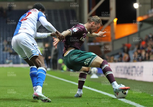 300925 - Blackburn Rovers v Swansea City - Sky Bet Championship -Josh Tymon of Swansea is pulled back by Ryan Alebiosu of Blackburn