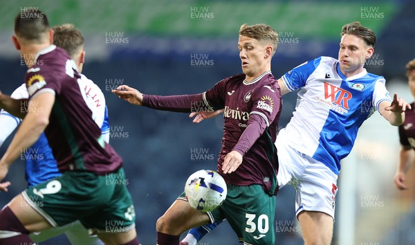 300925 - Blackburn Rovers v Swansea City - Sky Bet Championship - Ethan Galbraith of Swansea and Taylor Gardner-Hickman of Blackburn