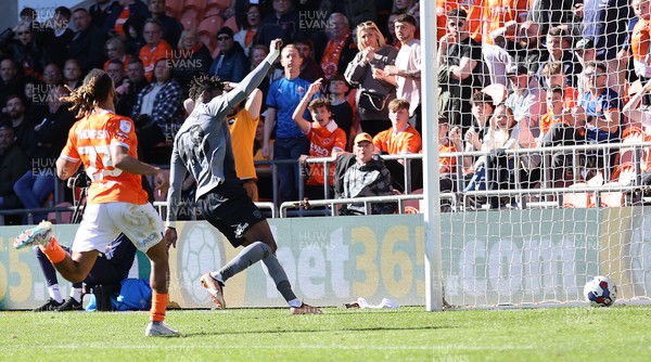 070423 - Blackpool v Cardiff City - Sky Bet Championship - Sory Kaba of Cardiff taps in the 3rd goal with Dominic Thompson of Blackpool following behind
