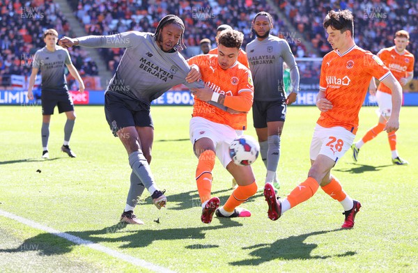 070423 - Blackpool v Cardiff City - Sky Bet Championship - Romaine Sawyers of Cardiff and Morgan Rogers of Blackpool and Charlie Patino of Blackpool