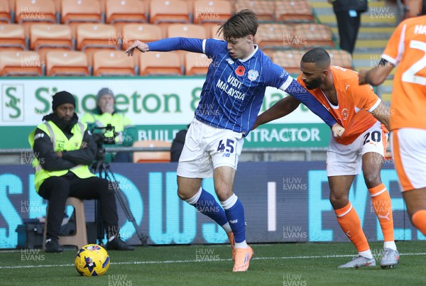 081125 - Blackpool v Cardiff City - Sky Bet League 1 - Cian Ashford of Cardiff is caught by Michael Ihiekwe of Blackpool