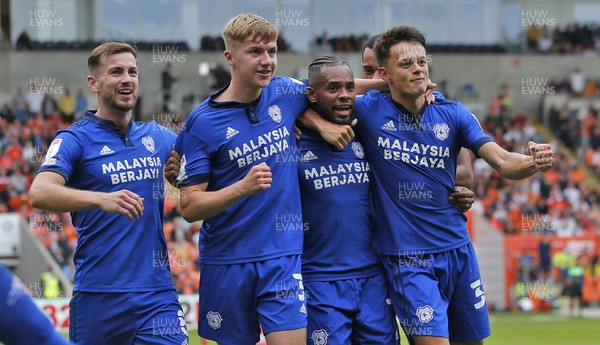 140821 - Blackpool v Cardiff City - Sky Bet Championship Leandra Bacuna of Cardiff (centre right) celebrates scoring the first goal of the match with Joe Ralls, Joel Bagan and Perry Ng