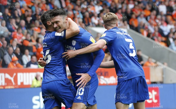 140821 - Blackpool v Cardiff City - Sky Bet Championship Kieffer Moore of Cardiff celebrates scoring the 2nd goal with Ryan Giles and Joel Bagan