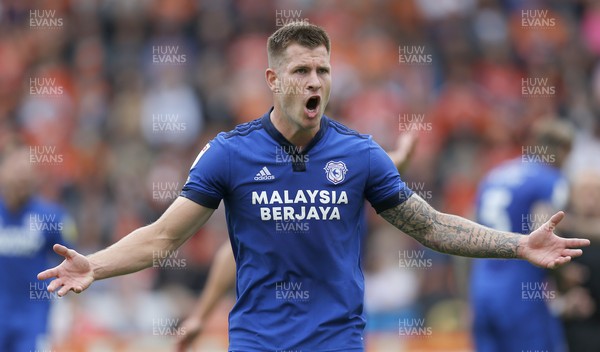 140821 - Blackpool v Cardiff City - Sky Bet Championship - James Collins of Cardiff disagrees with linesman