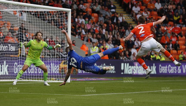 140821 - Blackpool v Cardiff City - Sky Bet Championship - James Collins of Cardiff tries a tricky shot on goal but puts the ball over the net 