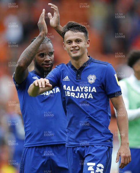140821 - Blackpool v Cardiff City - Sky Bet Championship - Leandra Bacuna of Cardiff and Perry Ng of Cardiff applaud the fans at the end of the match