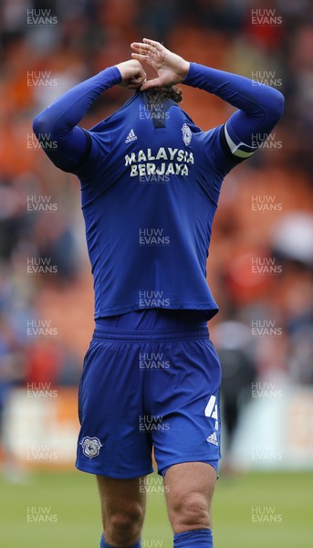 140821 - Blackpool v Cardiff City - Sky Bet Championship - Sean Morrison of Cardiff takes his shirt off to give to fans