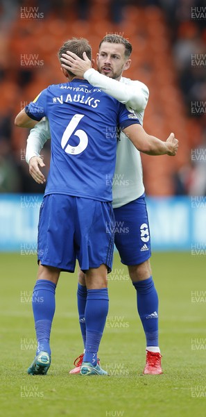140821 - Blackpool v Cardiff City - Sky Bet Championship - Joe Ralls of Cardiff with Will Vaulks of Cardiff at the end of the match