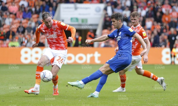 140821 - Blackpool v Cardiff City - Sky Bet Championship - Ryan Giles of Cardiff tries a shot on goal but is thwarted by Richard Keogh of Blackpool
