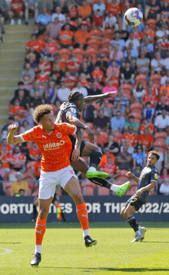 130822 - Blackpool v Swansea City - Sky Bet Championship - Michael Obafemi of Swansea and Rhys Williams of Blackpool