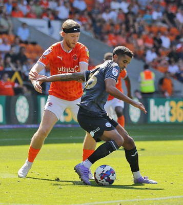 130822 - Blackpool v Swansea City - Sky Bet Championship - Kyle Naughton of Swansea and Josh Bowler of Blackpool