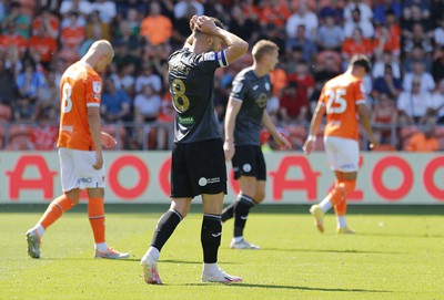 130822 - Blackpool v Swansea City - Sky Bet Championship - Matt Grimes of Swansea tries a shot on goal but misses