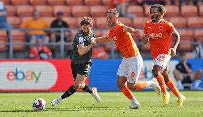 130822 - Blackpool v Swansea City - Sky Bet Championship - Joe Allen of Swansea and Jerry Yates of Blackpool