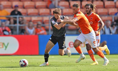 130822 - Blackpool v Swansea City - Sky Bet Championship - Joe Allen of Swansea and Jerry Yates of Blackpool