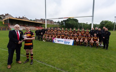 290525 - Blackwood RFC League Presentation - Blackwood RFC captain Josh Law is presented with the trophy by WRU representative Bryn Parker after winning the Admiral League Mens Division 2 East title