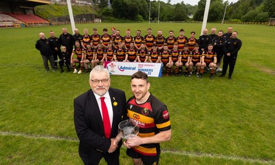 290525 - Blackwood RFC League Presentation - Blackwood RFC captain Josh Law is presented with the trophy by WRU representative Bryn Parker after winning the Admiral League Mens Division 2 East title