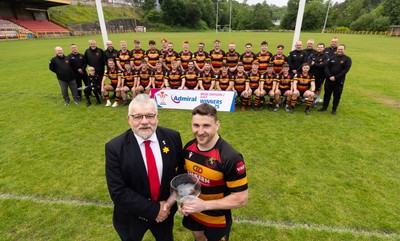 290525 - Blackwood RFC League Presentation - Blackwood RFC captain Josh Law is presented with the trophy by WRU representative Bryn Parker after winning the Admiral League Mens Division 2 East title