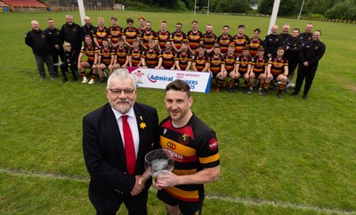 290525 - Blackwood RFC League Presentation - Blackwood RFC captain Josh Law is presented with the trophy by WRU representative Bryn Parker after winning the Admiral League Mens Division 2 East title